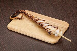 Delicous tasty Grilled octopus tentacle photo