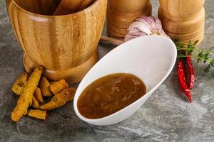 Indian curry sauce in the bowl photo