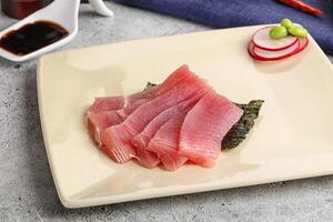 Japanese cuisine - sliced tuna sashimi photo