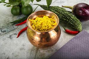 Indian cuisine - Lemon rice with spices photo