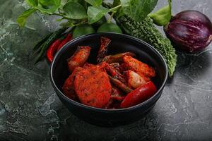 Indian cuisine - chicken tikka barbecue photo