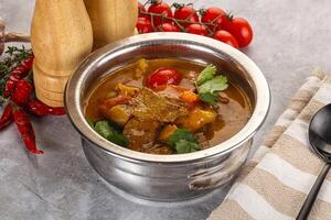 Yellow Thai curry with beef photo