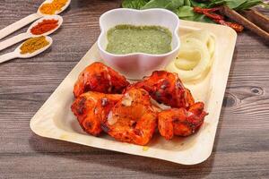 Indian cuisine - Chicken tikka barbecue photo