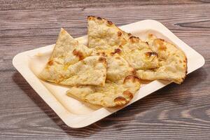 Indian tandoori bread - Butter naan photo