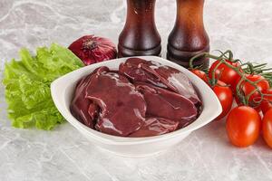 Raw turkey liver in a bowl ready for cooking photo