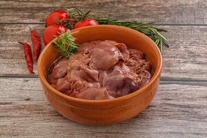 Raw chicken liver in the bowl photo