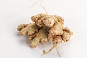 Raw ginger root fot cooking photo