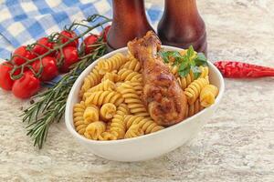 Roasted chicken leg with macaroni photo