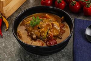 Yellow THai curry with beef photo