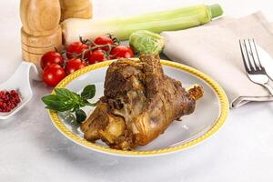 Baked Lamb shank with bone photo