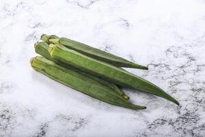 Green ripe tasty okra tropical vegetable photo