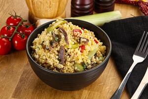 Bulgur with lamb and vegetables photo