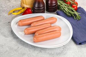 Boiled sausages for breakfast photo