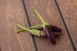 Baby organic purple eggplant heap photo