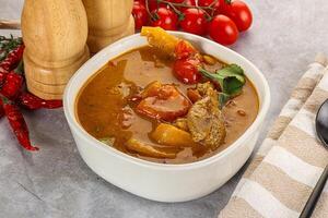 Yellow Thai curry with beef photo