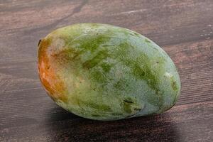 Ripe sweet green tropic mango photo