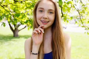 Healthy, beautiful smile, the child to the dentist.Portrait of a little girl with orthodontic appliance . photo