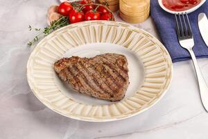 Grilled marble beef steak with sauce photo