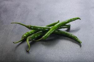 Hot and spicy green chili pepper photo