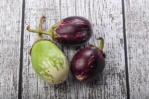 Heap of raw asian baby eggplant photo