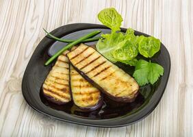 Grilled eggplants in the bowl photo