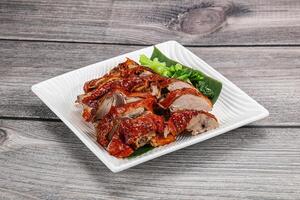 Asian cuisine - roasted duck with skin photo
