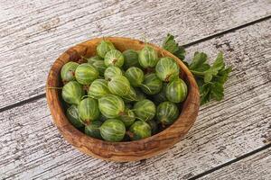 Natural ripe gooseberry heap in the bowl photo