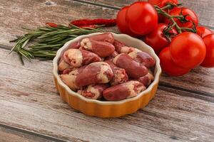 Raw chicken hearts for cooking photo