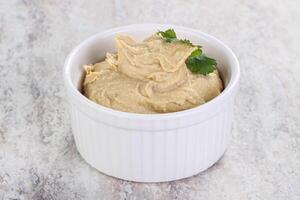 Traditional Jewish Hummus with olive oil photo