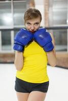 Brutal Fighter boxer woman close up. Sport Concept. photo