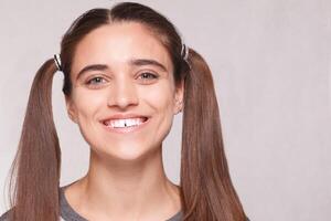 The young woman's portrait with happy emotions, smile photo