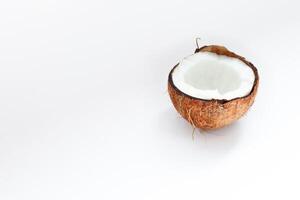 Half of coconut closeup on a white background photo