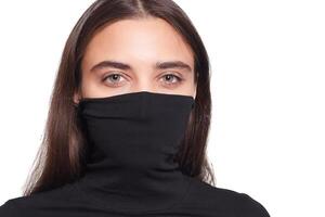 Confident female wearing black turtleneck sweater while posing photo