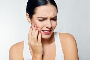 Teeth Problem. Woman Feeling Tooth Pain photo