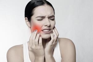 Teeth Problem. Woman Feeling Tooth Pain photo