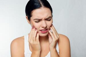 Teeth Problem. Woman Feeling Tooth Pain photo