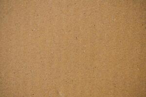 Brown vintage cardboard texture with a rough and grunge surface photo