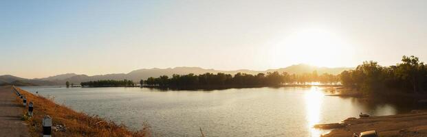 River and Lake Sunset and Sunrise with Beautiful Sky and Water Reflection photo