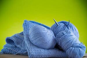 Set for hand knitting, blue yarn, knitting needles. photo