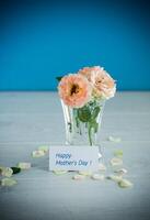 bouquet of beautiful orange roses on table photo