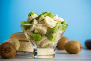 fruit salad of bananas and kiwi photo