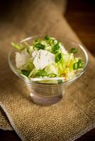 light spring salad with cauliflower, green onions photo