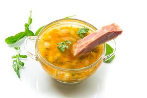 cooked smoked pea soup with ribs in a plate photo