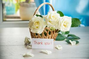 bouquet of beautiful white roses on table photo