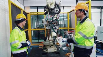 Engineer working and controlling robotics with monitoring system software automation robot arm. AI, Artificial intelligence. video