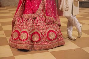 Indian Hindu traditional wedding ceremony rituals bride and groom's feet close up photo