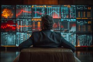 AI generated a man sitting in a chair looking at a screen with stock market data photo