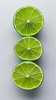 AI generated three slices of green lime on a white background photo
