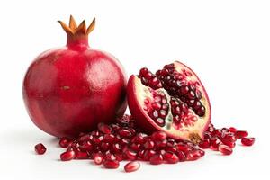 AI generated close up cut pomegranate and seeds isolated on white background photo