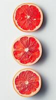 AI generated three red fruit slices on a white background photo